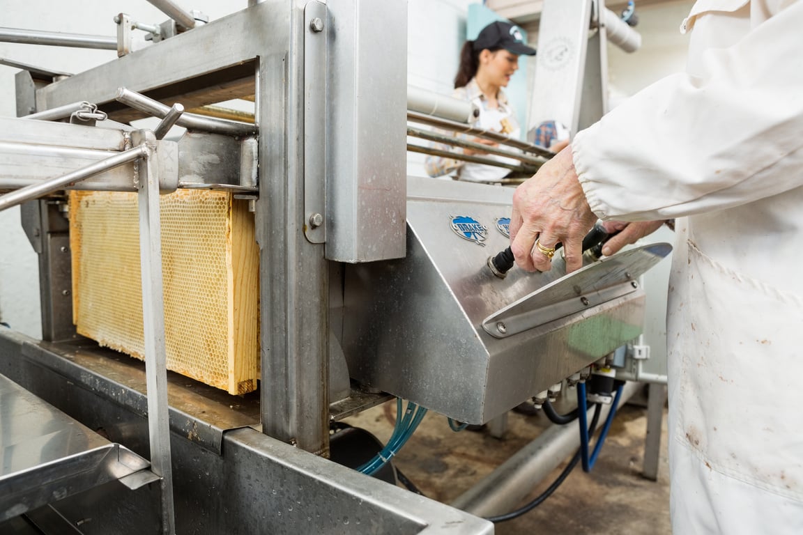 Beekeeper Operating Honey Extraction Plant